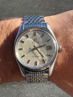 1971 Omega Seamaster (Ref. 166.067) w/ Frosted Dial, original “Beads of Rice” bracelet.