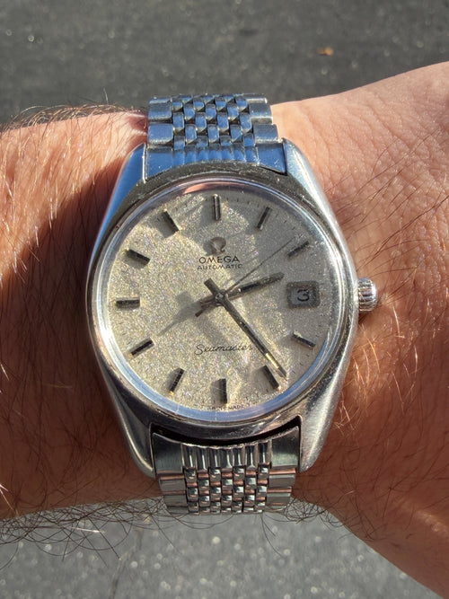 1971 Omega Seamaster (Ref. 166.067) w/ Frosted Dial, original “Beads of Rice” bracelet.
