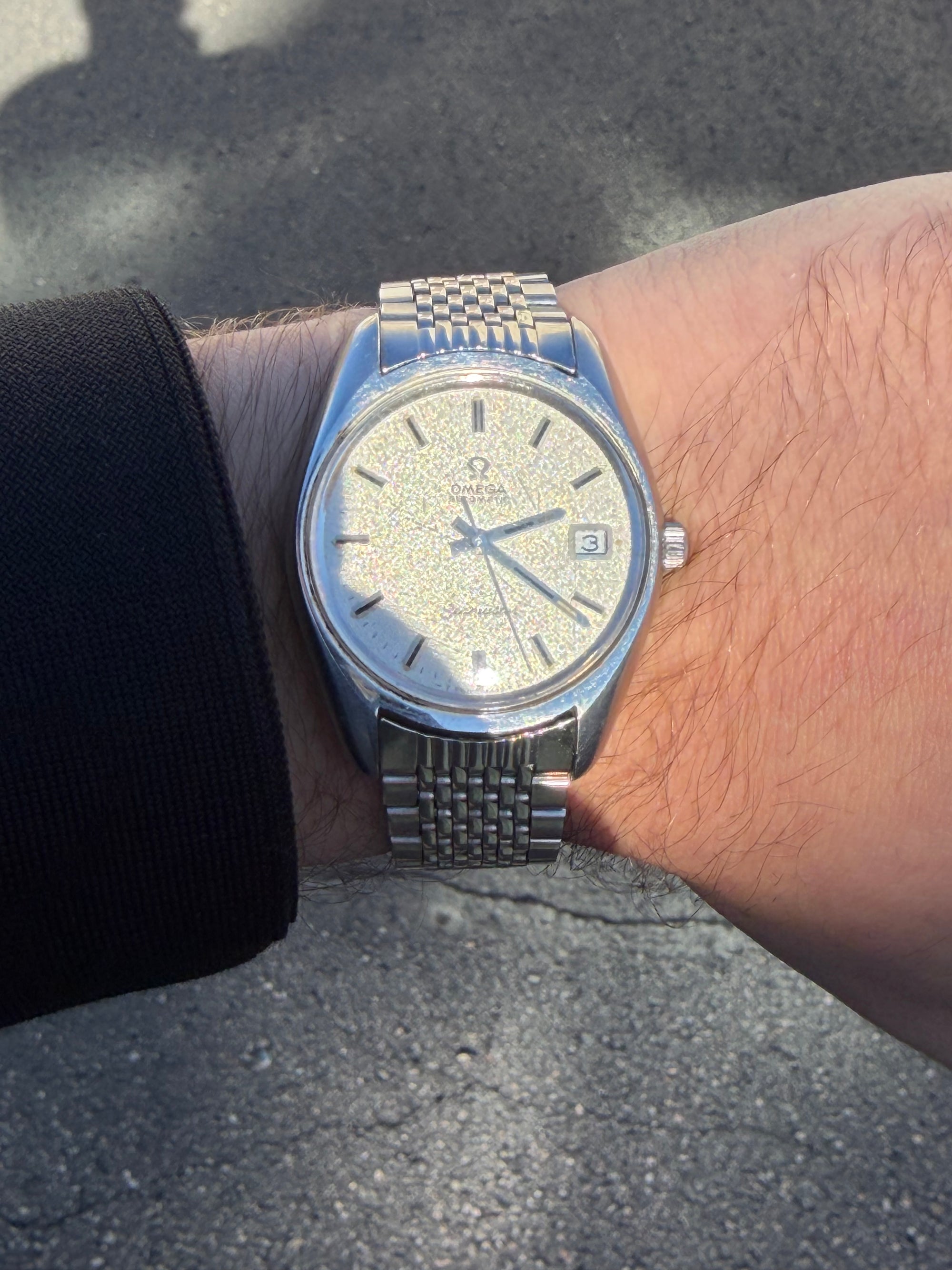 1971 Omega Seamaster (Ref. 166.067) w/ Frosted Dial, original “Beads of Rice” bracelet.